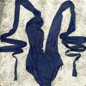 Multi style wrap body suit.
